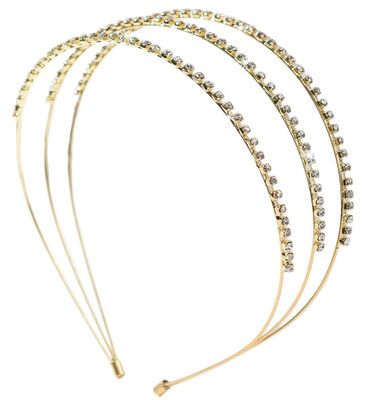 Grampos de cabelo e garras metálicas em acabamento dourado